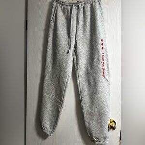 Brunette The Label Gray Sweatpants with Red Heart and Text